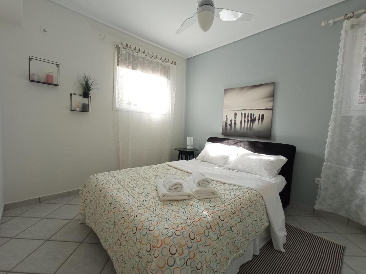 Flat With Garden Near Sea, Port And Airport Apartment Artemida  Bagian luar foto